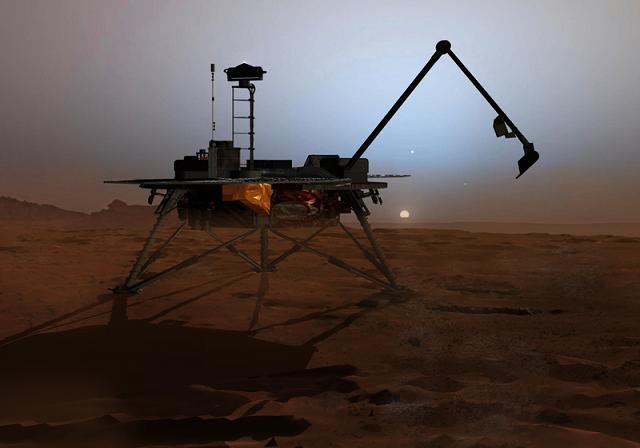 Аппарат Phoenix Mars Lander берет пробу воды на марсианском грунте